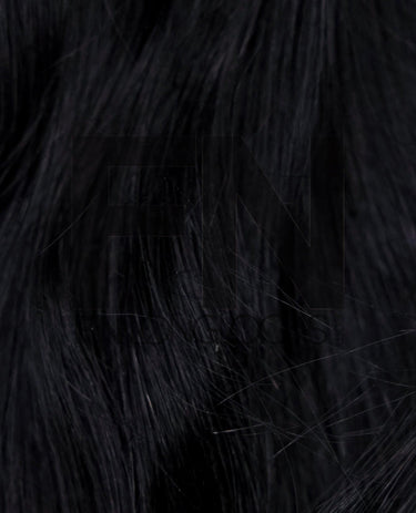 Luxury 100% real human remy hair extensions, sleek black strands for natural volume and length.