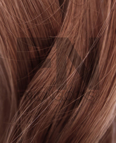 Luxury real human Remy hair extensions with smooth, silky strands in rich brown tone