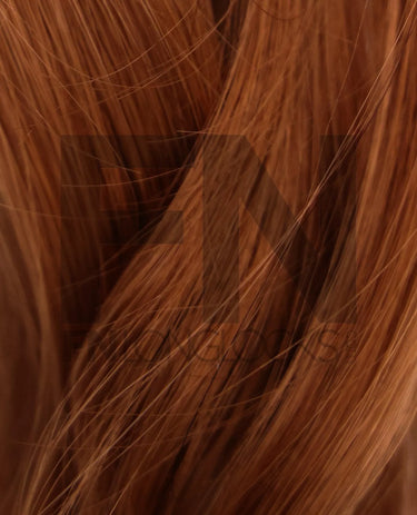 Luxury real human remy hair extensions with smooth, shiny texture for natural volume and length.