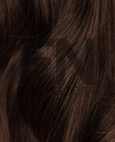 Luxury real human remy hair extensions with smooth, shiny texture for natural volume and length.