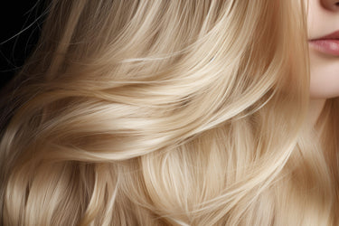 Luxury blonde human hair extensions with smooth, silky texture and natural shine