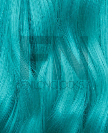 Vibrant teal human hair extensions with smooth, silky texture for luxury styling
