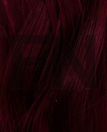 Deep burgundy human hair extensions, smooth and silky texture for luxury volume and length.