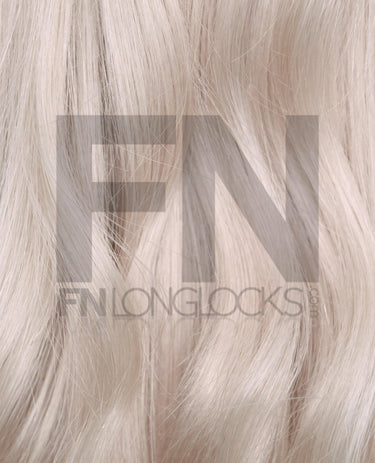 Smooth blonde Remy hair extensions with natural shine and soft texture for salon use