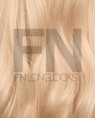 Luxury blonde human hair extensions, smooth and silky texture for natural volume and length.